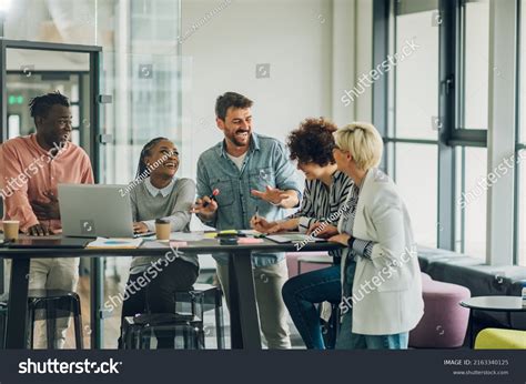 Multicultural Professional Project Managers Group Negotiating Stock