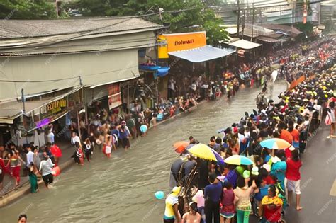 Premium Photo | Bangkok Thailand April 13 2025 Crowds celebrate