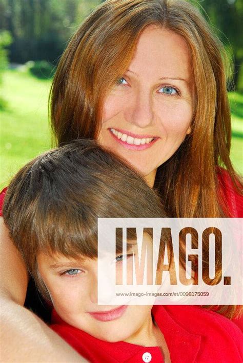 Mother And Son Portrait Of Smiling Mother And Son In Summer Park Y