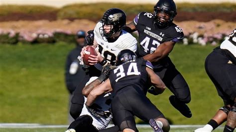 Porter scores two touchdowns and Northwestern beats Purdue 23-15 - Newsday