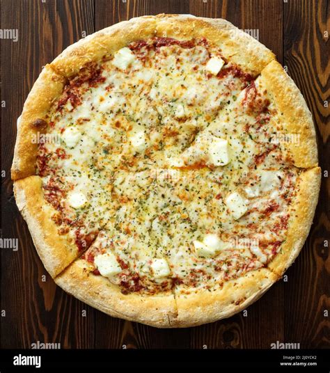 Four Cheese Pizza With Dor Blue Parmesan Feta Oregano Mozzarella