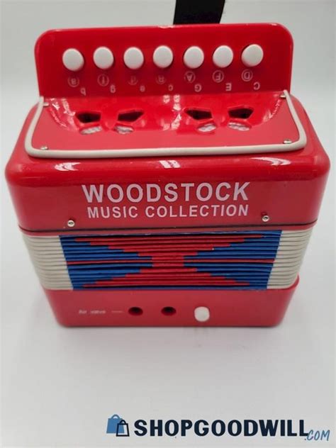 Childs Toy Accordion That Plays Music From The Woodstock Music