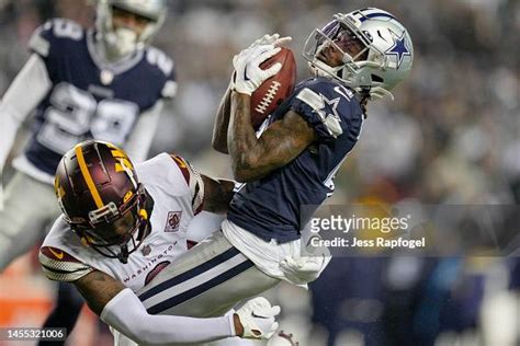 KaVontae Turpin of the Dallas Cowboys is tackled by Dyami Brown of ...