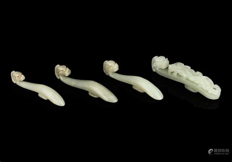 Bidlive Four Chinese Celadon Jade Chilong Belt Hooks