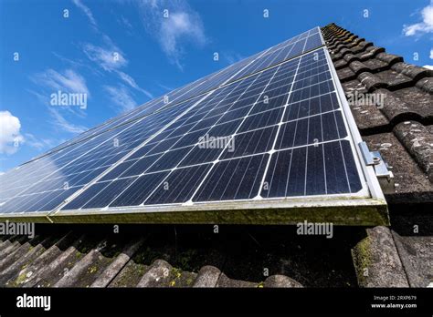 Roof Mounted Solar Collectors On Residential House Stock Photo Alamy