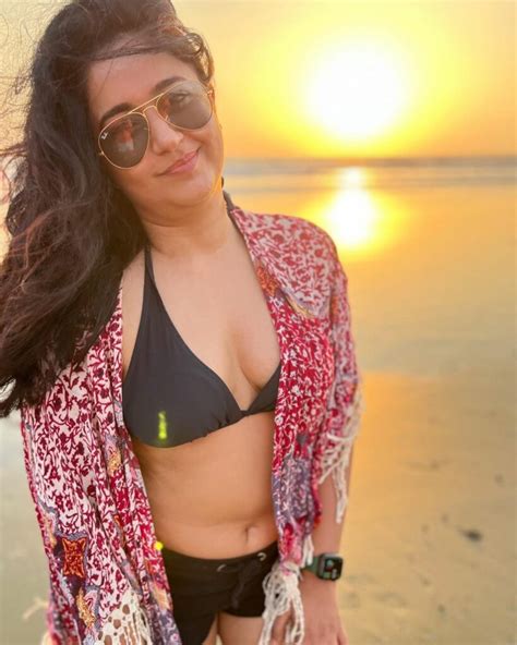 Poonam Maximises Hotness In Black Bikini