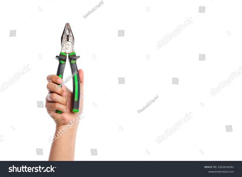 Human Hand Holding Pliers Isolated On Stock Photo 2202634241 Shutterstock