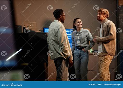 Group of Three People Standing in Office and Talking Stock Image - Image of digital, programmer ...