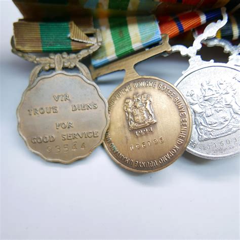 A Set Of Six Mounted Rhodesian Medals Including South African Merit