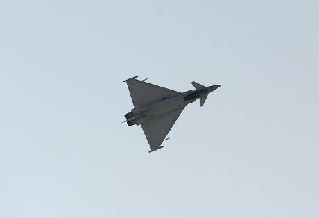 typhoon fighter jet performs aerial maneuvers editorial stock photo