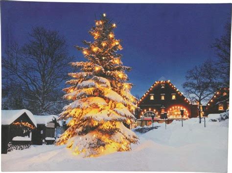 Canvas Op Houten Frame Verlichte Kerstboom In De Sneeuw