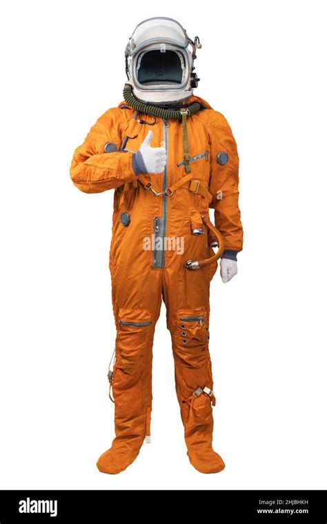 Astronauta Con Un Traje Espacial Naranja Y Un Casco Que Muestra Un