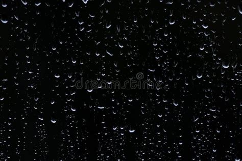 Glass With Rain Drops Against Dark Background Natural Abstract Texture