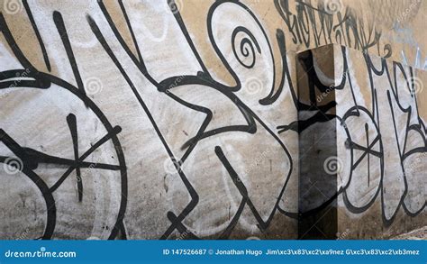 Graffiti On White Brick Wall Of Building Editorial Photo ...