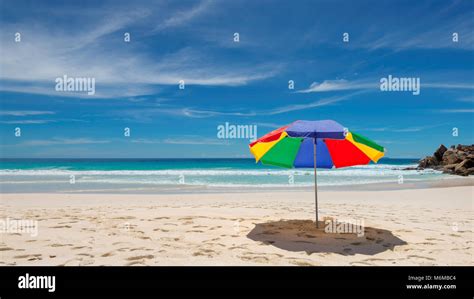 Umbrella On Tropical Beach Stock Photo Alamy