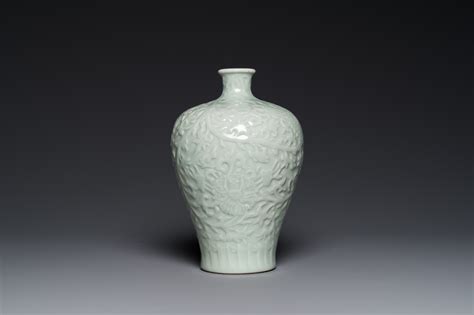 A Chinese Celadon Glazed Lotus Scroll Meiping Vase Kangxi Mark