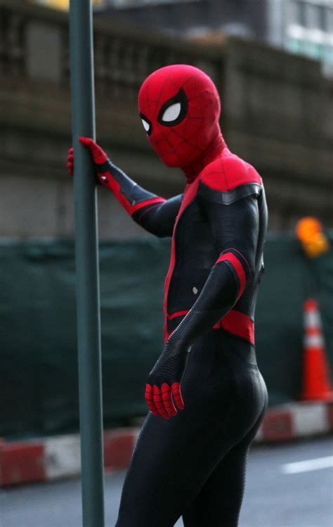 Tom Holland In Spider Man Suit Wallpaper