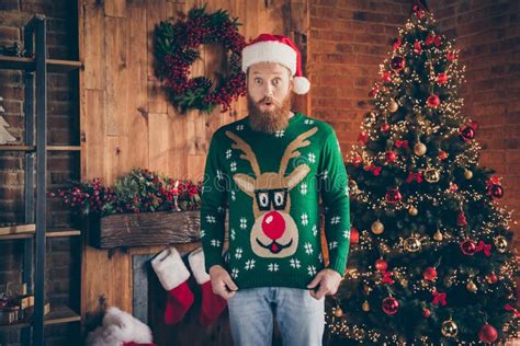 Photo Of Excited Funky Shocked Guy Open Mouth Wow Reaction Wear Santa Headwear Pullover