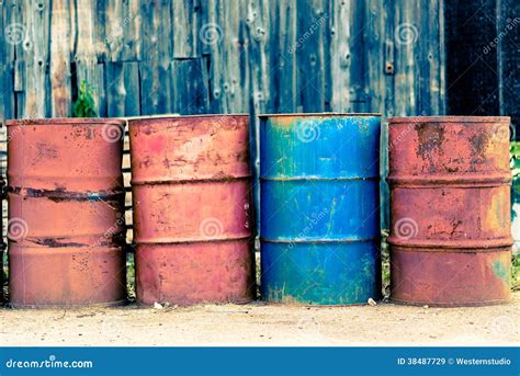 Four Old Barrels For Oil Petroleum Red And Blue Stock Image Image