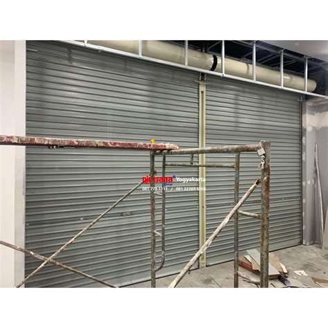 Pemasangan Rolling Door One Sheet Full Perforated Di Erigo Rita Mall