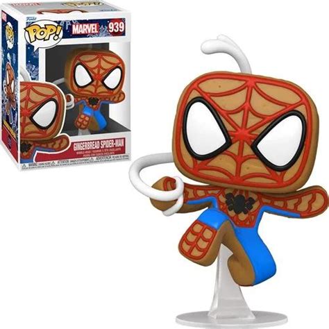 The Pop Vinyl Figure Spider Man Is On Display In Front Of A White Box