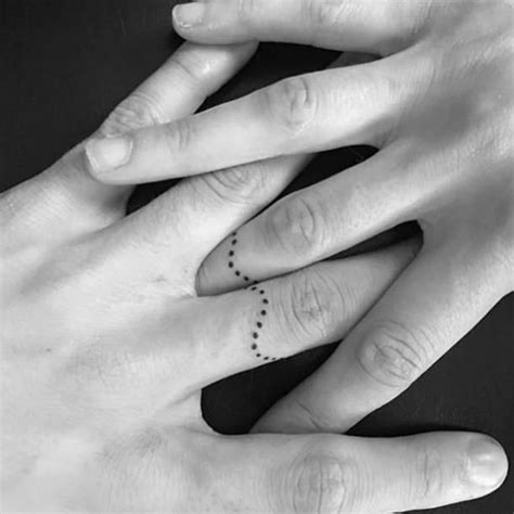 40 Simply Stunning Wedding Ring Tattoos For Couples Wedding Ring