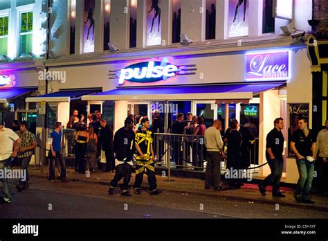 People Gathered Outside Nightclubs And Bars In Norwich Uk Stock Photo