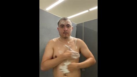 Latino Having A Shower At Gym