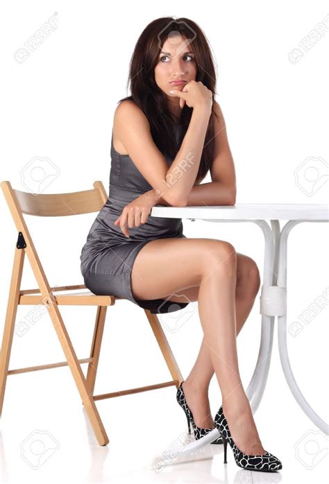 Woman Sitting At A Table Google Search Stock Photos Woman Women Girl