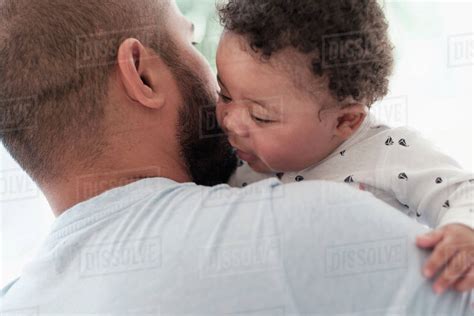 Father Holding Baby Son Stock Photo Dissolve