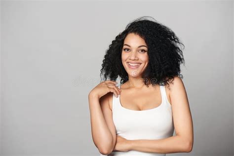 Relaxed Mixed Race African American Caucasian Woman Standing In