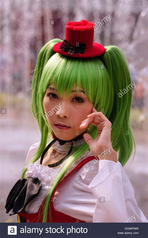 Cosplay Harajuku Girl With Green Hair Dressed As A Japanese Manga