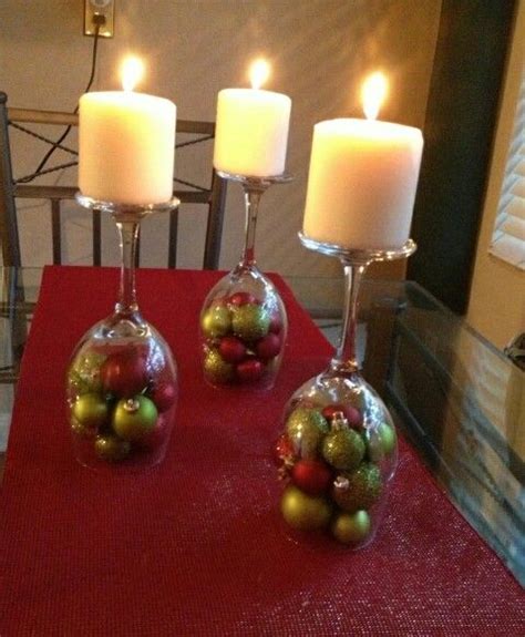 Upside Down Wine Glasses Filled With Mini Ornaments Topped With