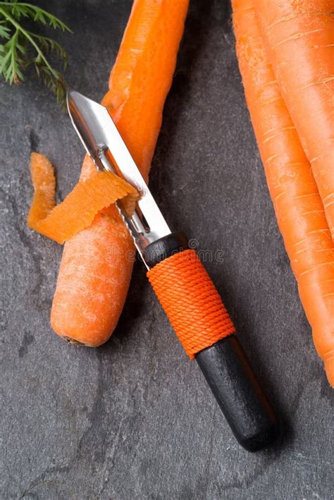 Carrot Getting Peeled With A Peeler Stock Image Image Of Peeling