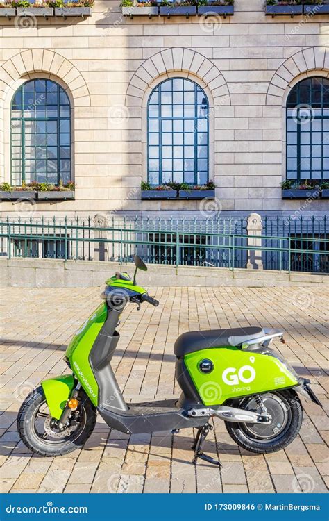 Electric Rental Scooter On The Coolsingel Shopping Street In Rotterdam