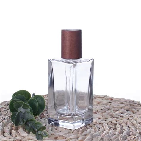 Huajing Square Empty Clear 50ml Crimp Neck Perfume Spray Glass Bottle