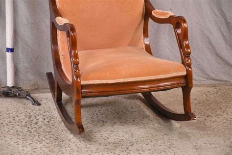 Carved Swan Head Open Arm Rocking Chair With Peach Color Fabric