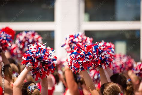 Red, White and Blue Pom Poms, American Cheerleader, Cheerleaders Holding Pom Poms Over Heads ...