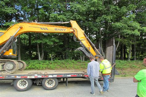 Dump Truck Towing Excavator Strikes Damages Maine Turnpike Overpass