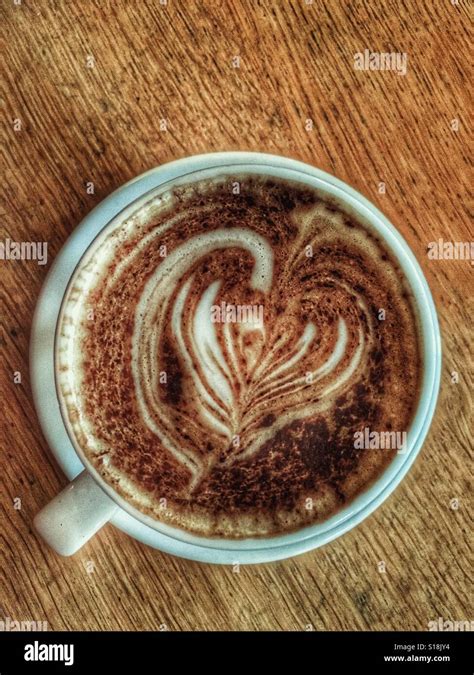 Cappuccino coffee art Stock Photo - Alamy