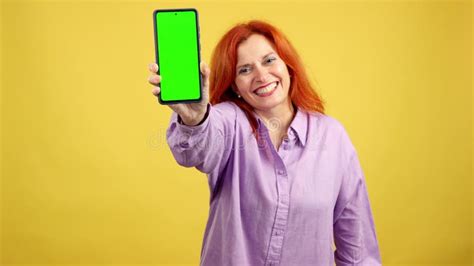 Happy Mature Redheaded Woman Smiling While Using The Mobile Stock Footage Video Of Cyberspace