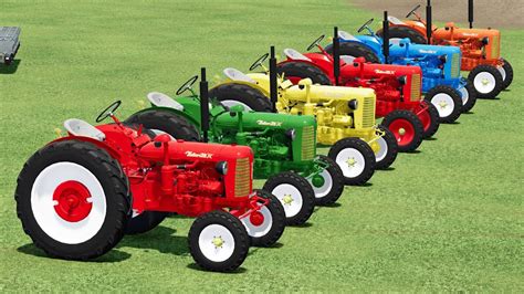 TRANSPORTING SPREADING LIME With MINI PORSCHE TRACTORS COLORED