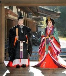 A Couple Dressed In Heian Robes At Kimono Photography Experience