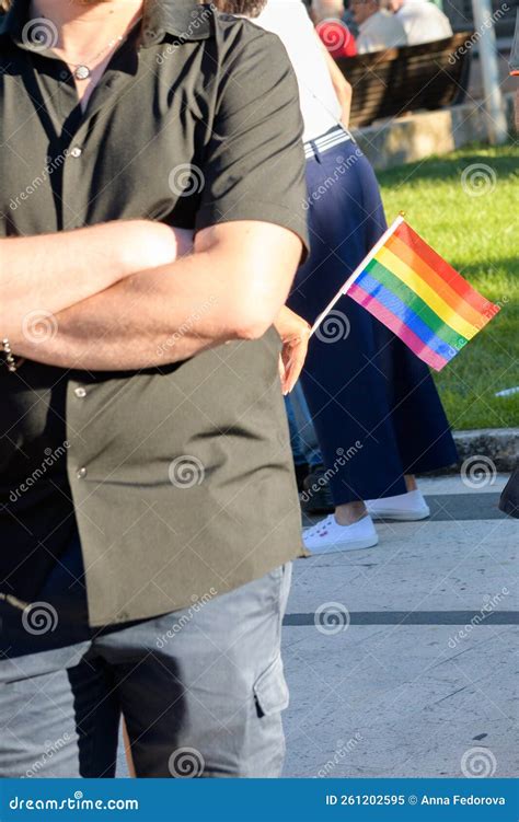 Lgbt Rainbow Flag In A Male Hand During Gay Pride Close Up Selective