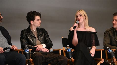 Timothée Chalamet And Elle Fanning Recreate Iconic Holding Space