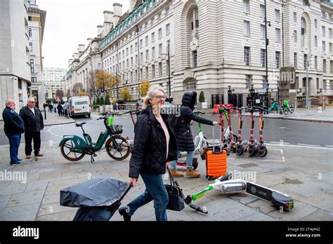 London UK 27th November 2023 Lime And Eoi E Scooters For Hire Near