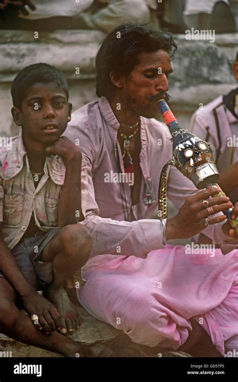 Langa musician and boy Stock Photo - Alamy