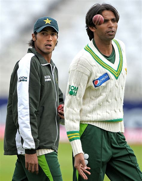 Mohammad Amir and Mohammad Asif head for the nets session ...