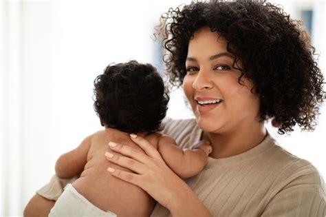 Premium Photo Cheerful Millennial African American Woman Hold Small