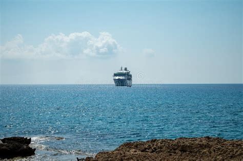 View On Seashore With Blue Crystal Clear Water On Mediterranean Sea